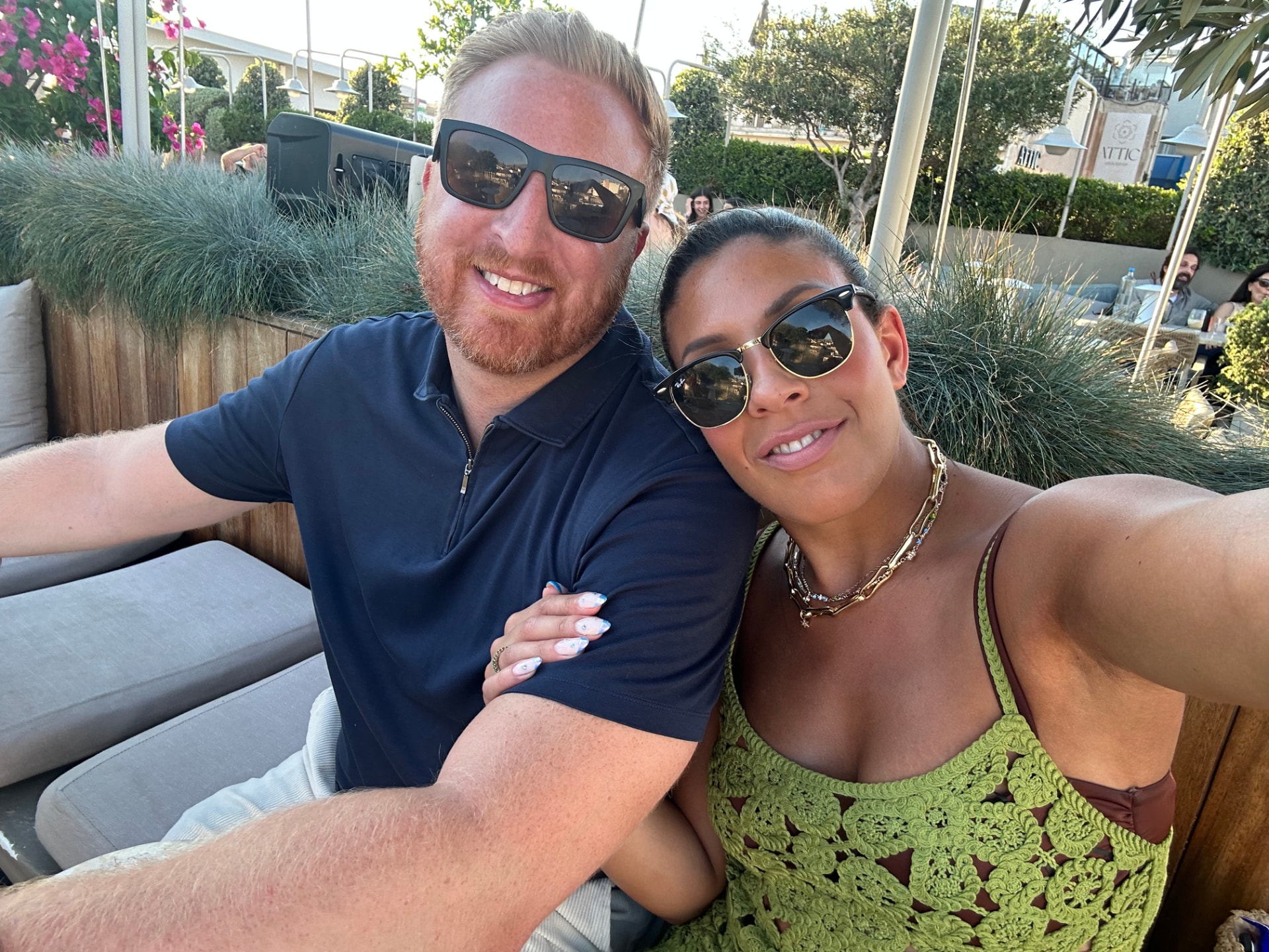 Tim and Sophie together on a terrace on the Athens Riviera